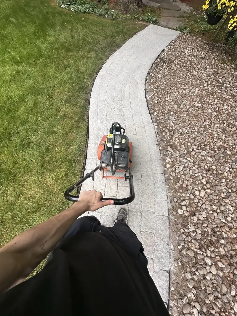 Compactage de pavé — chemin courbe